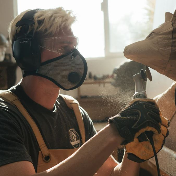 Woodworker wearing an M2 RZ Mask