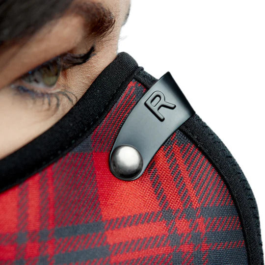 close up shot of the a woman wearing the rz mask m2 red plaid - zoomed in one the bridge of her nose to demonstrate sealing the nose piece.
