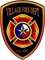 Village Fire Department logo with shield design and text