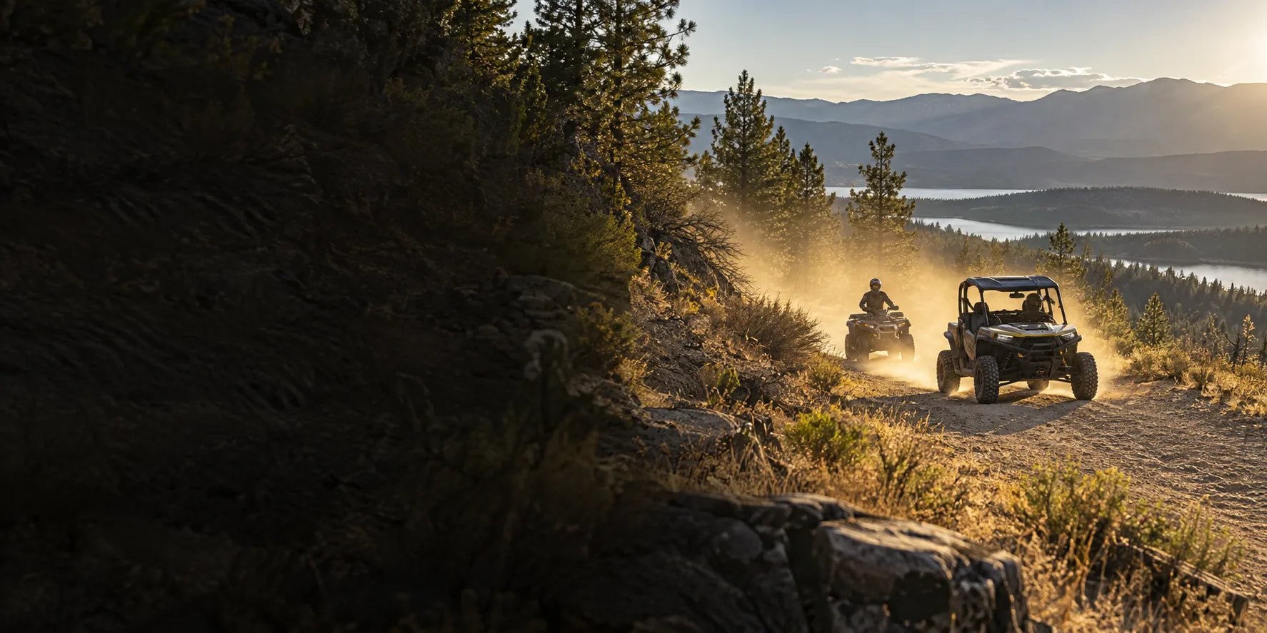 Off-road vehicles on a dusty trail